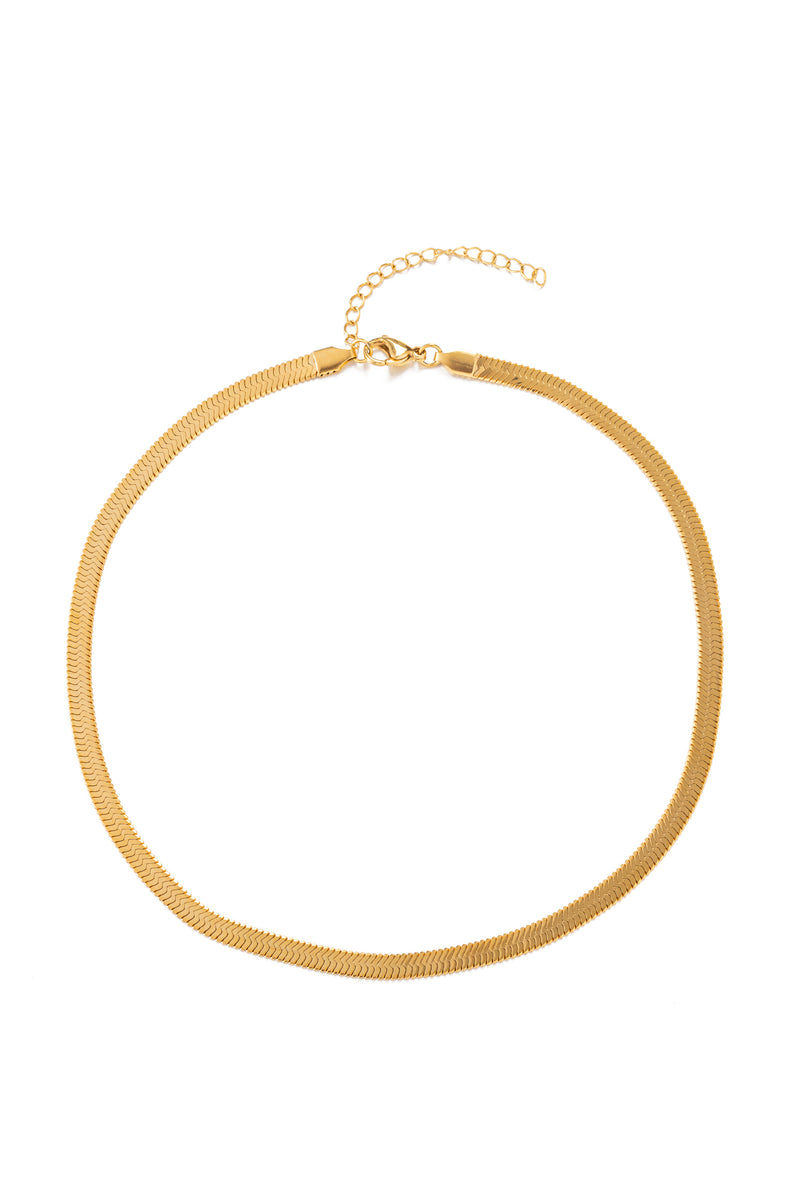Gold tone brass single strand necklace.